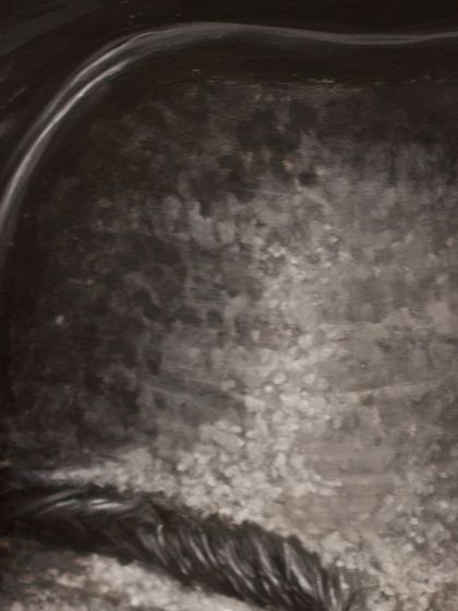 A close-up showing the textured brushstrokes on the forehead. This technique helps to convey the history and character etched into a person's face.