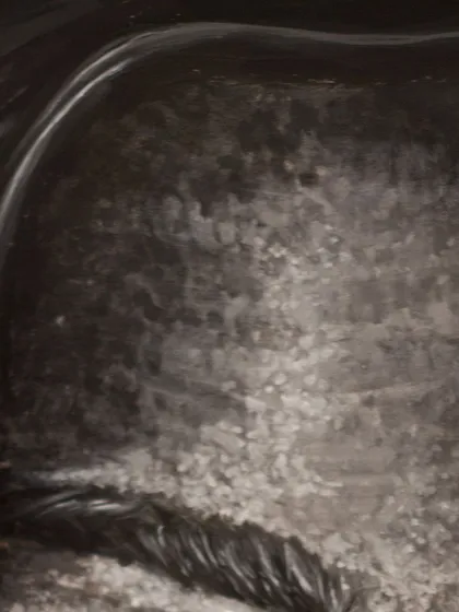A close-up showing the textured brushstrokes on the forehead. This technique helps to convey the history and character etched into a person's face.