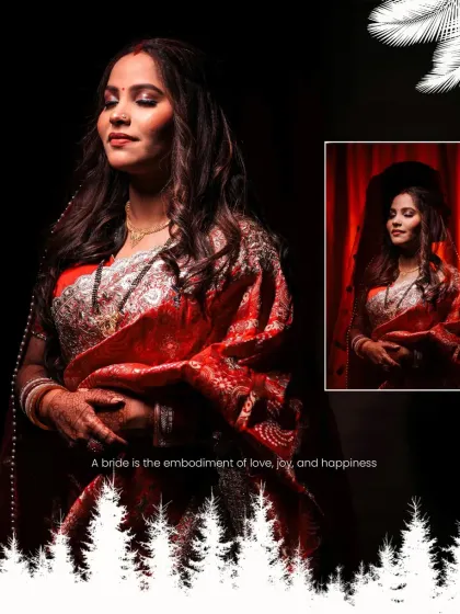 A serene portrait of the bride on her reception night. The dark background and soft lighting create a calm, elegant mood, emphasizing her contentment and the beauty of her red saree.