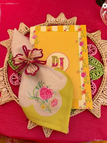 A beautifully detailed place setting from Jeet Adani and Diva Shah’s mehendi. The custom menu and embroidered napkin reflect a deep commitment to personalisation and theme.
