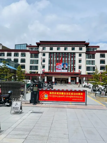 A government building in Nyalam, showcasing the unique blend of modern and traditional architecture in the region.