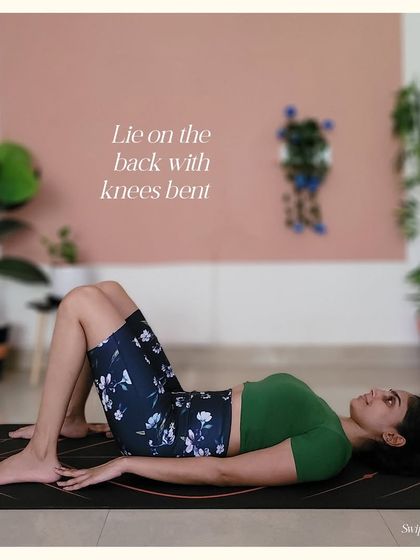 The first step to upward bow pose is lying on your back with knees bent. This initial setup is crucial for the steps that follow.