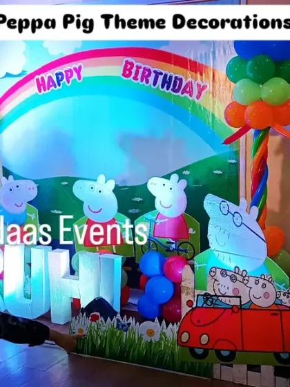 The Peppa Pig theme comes to life with spotlights. This photo shows how lighting can transform the setup and create a magical atmosphere for the evening celebration.