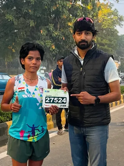 An athlete proudly displays her bib for the 21km SBI Marathon. She is one of the many winners from my club who performed exceptionally at this event.