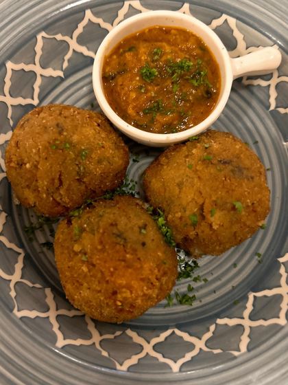 Comfort food at its best. These mozzarella and basil croquettes from Rose Cafe are a must try, and this simple plating lets the food speak for itself.