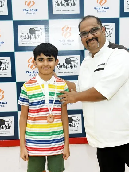 A young runner-up receiving his medal. We believe in celebrating the effort and participation of every single player in our tournaments.