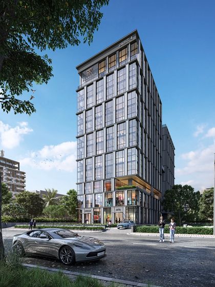 A render of the diamond-inspired commercial tower in Surat, showing its relationship to the street. The design combines retail spaces at the base with office floors above, all within a sleek, glass-clad structure.