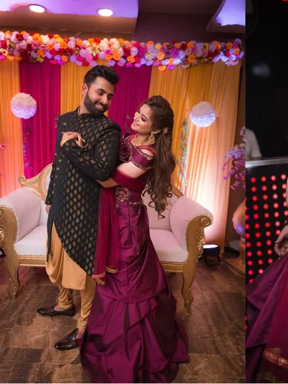 A beautiful moment from a Roka or engagement party. The couple shares a dance, lost in their own world, with a colorful and festive decor behind them.