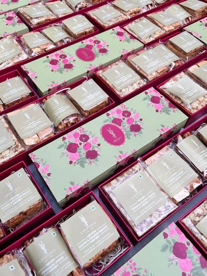 A large order of our gift hampers, filled with assorted teacakes and crackers, ready for a special event.