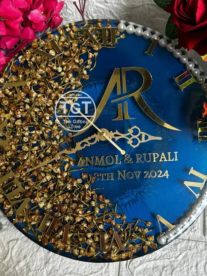 This image shows the clock with a pearl border, adding a classic touch to the modern design of the preserved floral art.