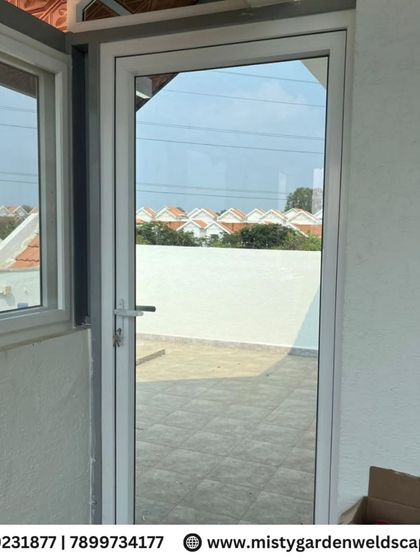 A single UPVC door providing access to the open terrace area. Its sleek design and durable construction make it a perfect choice for high-traffic outdoor spaces.