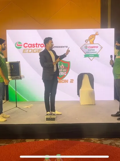 Explaining a complex illusion to volunteers on stage. It's important that the audience follows every step of the journey.