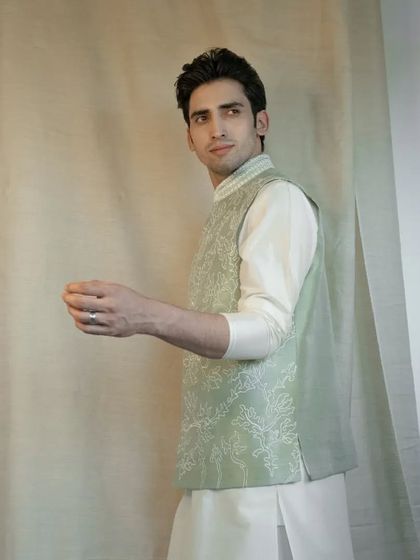 Our pastel collection offers a subtle yet powerful style statement. This pista green jacket is a testament to understated elegance.