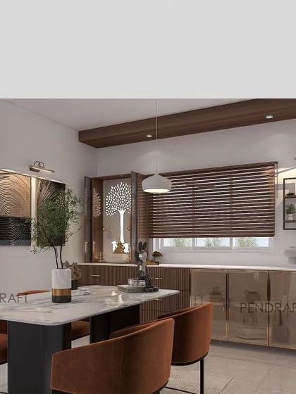 This dining room design cleverly incorporates a mandir and a display unit into the crockery cabinet. The large windows and modern lighting fixtures ensure the space is bright and welcoming.