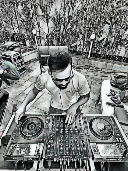 A cool black and white artistic shot of me at the DJ console during an outdoor pool party setup. Beat, Bass, Bang.