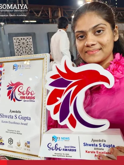 Shweta Gupta proudly displays her Karate Excellence Award from the SOBO Awards, recognizing her outstanding achievements in the sport.