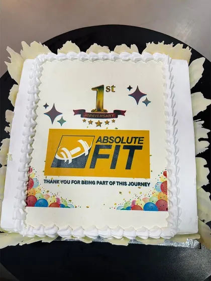 Our first anniversary cake, marking a milestone of fitness and community.