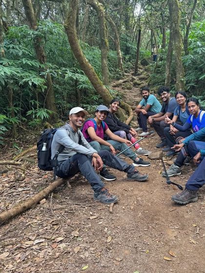 Taking a much needed break on the forest trail. The Kumaraparvatha trek is long, and I ensure we pace ourselves with enough rest stops.