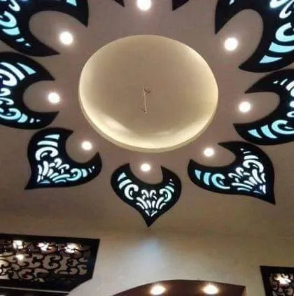 A beautiful floral-inspired design using backlit jali cutouts. The pattern radiates from the center, creating a stunning visual effect that is both organic and elegant.