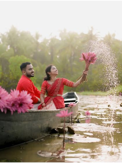 Creating a splash of fun. This candid shot of her playing with the water adds a dynamic and joyful element to the photoshoot.