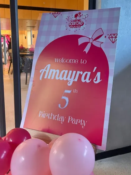 A personalized welcome sign for Amayra's 5th Barbie-themed birthday party, setting the tone right from the entrance.