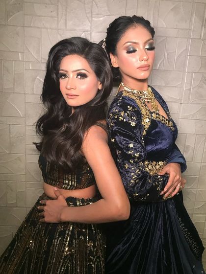 A back-to-back pose showcasing the beautiful work from my masterclass students. The looks are glamorous and perfectly executed.