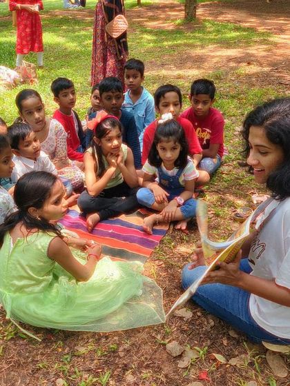 A fantastic series from our reading of 'Handa's Surprise'. My animated storytelling style is on full display, as are the delighted and curious faces of the children.