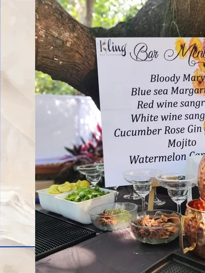 A simple, floral-themed bar menu for an outdoor event, proving that even casual setups can be elegant and personalized.