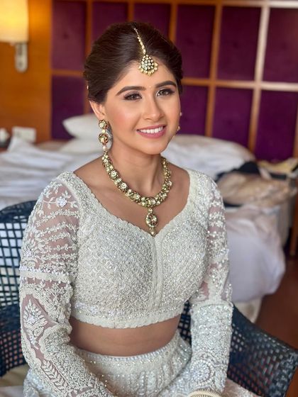 Timeless Bridal Buns & Updos photo 13