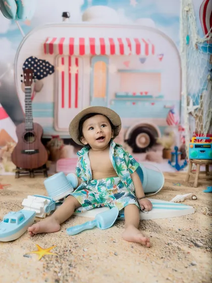 Looking up with a happy expression, this little guy is enjoying his day at the "beach" in my studio.