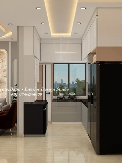 An open kitchen overlooks the living area, showcasing a seamless transition between spaces. This design is perfect for modern lifestyles, allowing for interaction even while cooking.