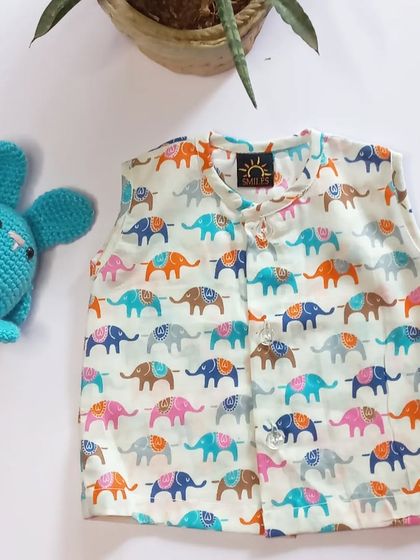 Our colorful elephant print jhabla is another adorable option for newborns. The front buttons make it easy to put on, and the soft cotton is perfect for delicate skin.