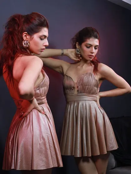 Another perspective of the gold dress, showing how the two models create a dynamic and engaging composition. This is part of the creative direction I provide during shoots.
