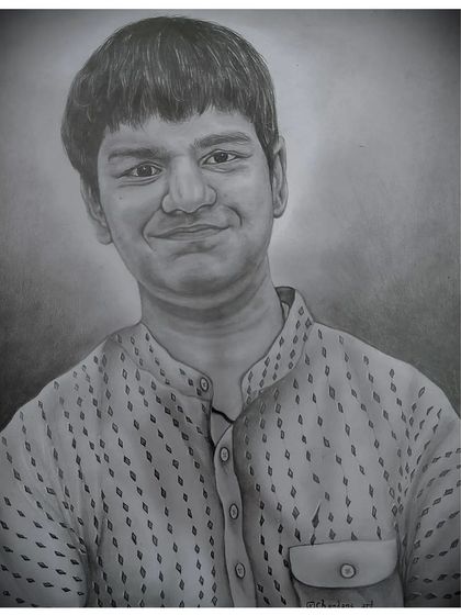 A custom graphite portrait of a young man. The focus here was on creating a soft, friendly expression with subtle shading. These pencil sketches are a great way to capture the personality of a loved one.