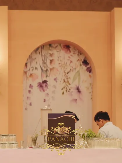 A detail of the bar backdrop, featuring a beautiful watercolor floral print.