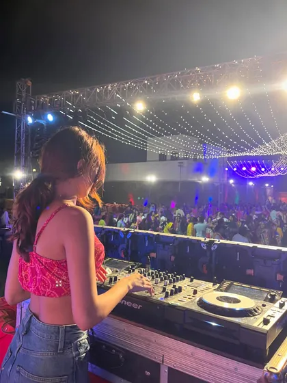 Bringing the energy to a massive Dandiya night under the stars. I love mixing traditional festive tracks with modern beats to create a unique sound that keeps everyone dancing with their dandiya sticks all night long.