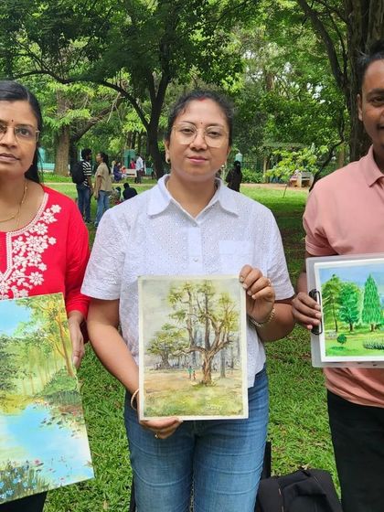 Three of us showing our finished landscape paintings after a productive session at Cubbon Park. It's amazing to see how each artist interprets the same scenery in their own unique style.