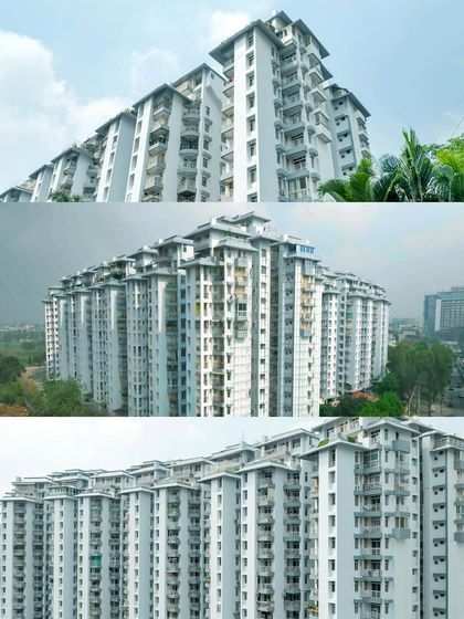 Various angles of a completed residential tower, providing a detailed look at the facade, balconies, and overall structure for construction and real estate clients.