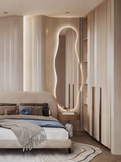 A guest bedroom visualization characterized by soft, organic forms. The render focuses on the wavy, backlit mirror and the curved headboard, creating a gentle and calming space.