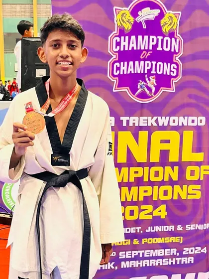 Another shot of our young champion Karan, celebrating his victory.