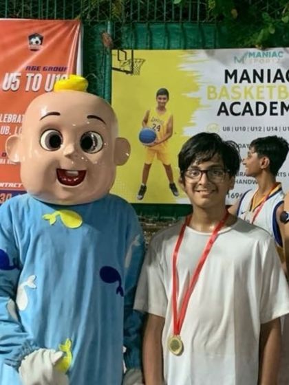 Another happy player with his medal from "The Carnival." We believe in recognizing hard work and celebrating participation.