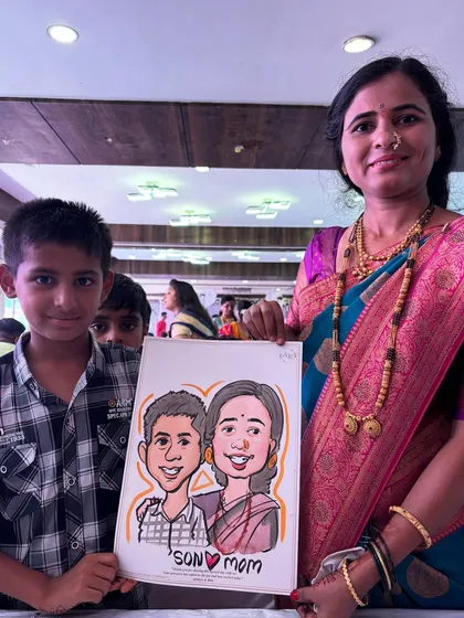 A proud mother and son with their dual caricature. These portraits are perfect for celebrating family connections at any event.