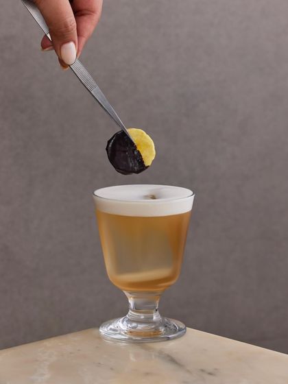 The Anna Banana is our playful, dessert-inspired cocktail. It features coconut-washed gold rum, banana liqueur, and a splash of vanilla cold brew for a rich and tropical flavor profile.