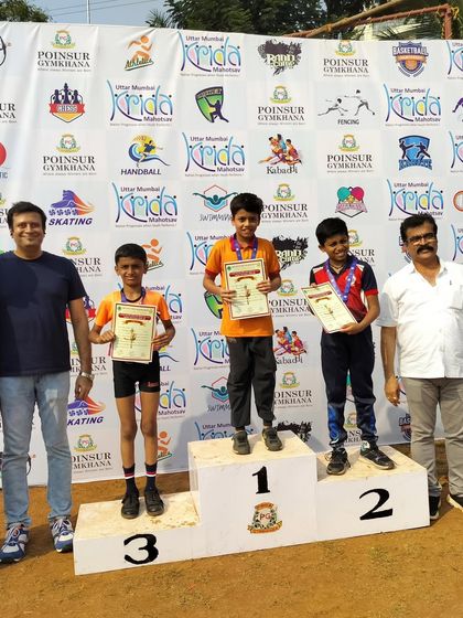 The official winners' podium for the Under-12 Mallakhamb competition at Poisar Gymkhana. Seeing our students on these platforms inspires the entire academy to strive for excellence.