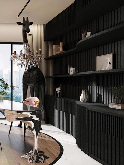The office space in "Whimsy Wonder" is dramatic and sophisticated, featuring a black fluted wall, a sculptural desk, and a life-sized giraffe holding a crystal chandelier.
