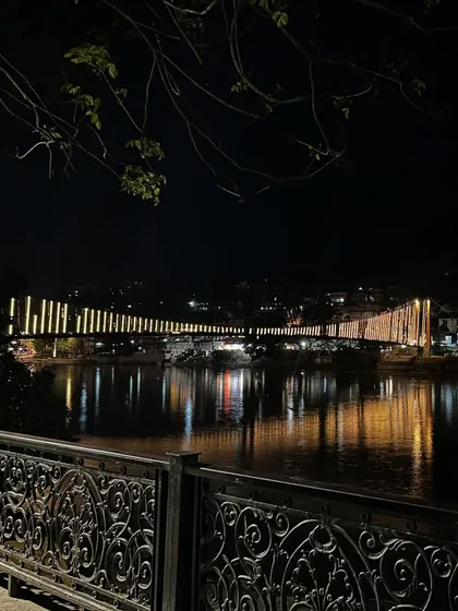 The Ram Jhula bridge at night, reflecting on the Ganga. The energy of this place is deeply humanizing and grounding. It is where I draw power and clarity for my spiritual practice.