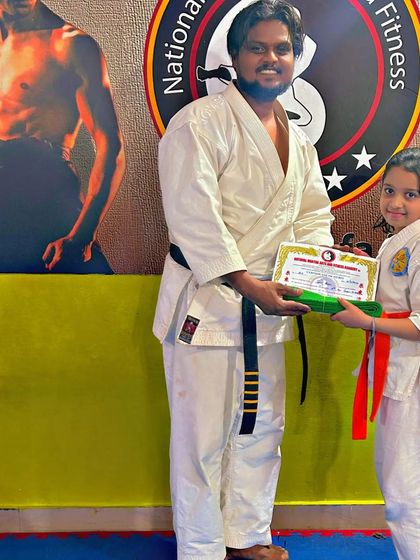 National Martial Arts and Fitness Academy - Kids Martial Arts & Fitness The Journey of Discipline: Belt Graduations photo 26