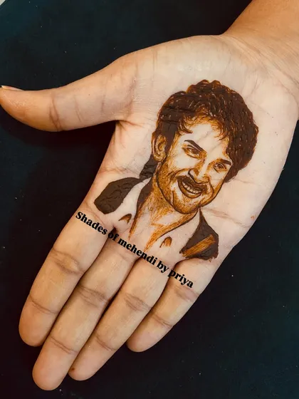 A realistic mehendi portrait of actor Dulquer Salmaan. I love the challenge of capturing a person's smile and expression using only henna.
