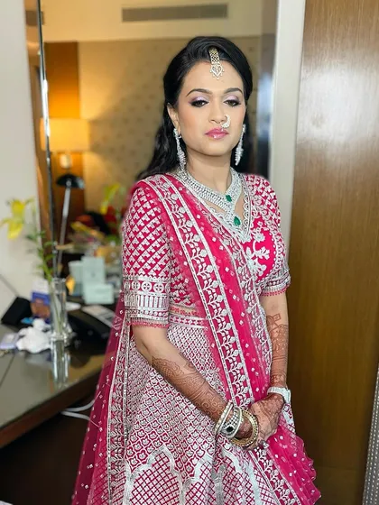 Naturally radiant in a stunning pink and silver lehenga. I focused on a fresh, dewy base and soft pink tones on the eyes and lips for a cohesive and elegant family wedding look.