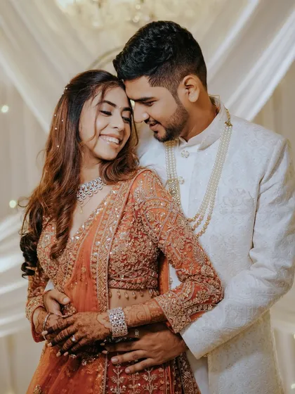 The look of love. This candid shot captures a beautiful, unposed moment between the couple during their engagement, their smiles saying everything.